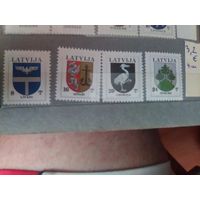 Серия марок Латвии с гербами.
