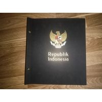Иллюстрированный альбом для марок Индонезии 1994-2003 годов с прозрачными двойными клеммташами.
