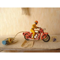 Детская электромеханическая игрушка "Мотоцикл". СССР, 1983 год.