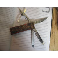 Ножик советский перочинный с пилкой, ножницами и опасной бритвой.