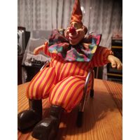 Сувенир игрушка - Клоун в кресле