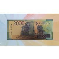 Сувенирная пластиковая банкнота в позолоте 2000 рублей России